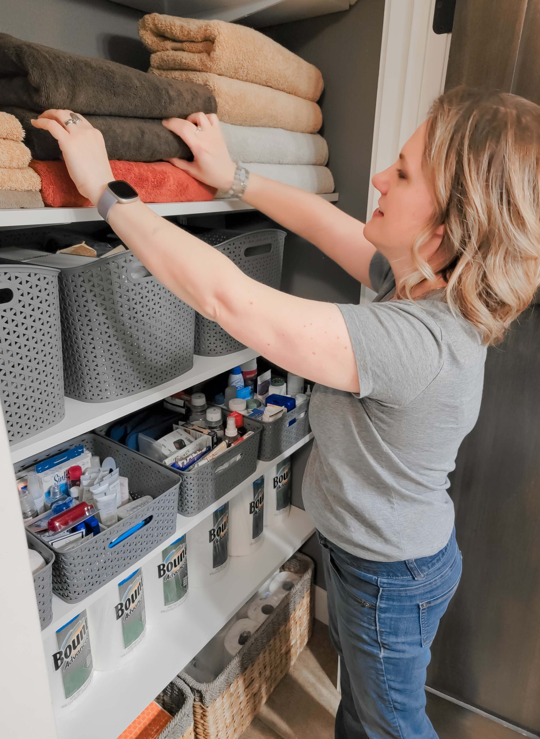 Carolyn organizing a closet